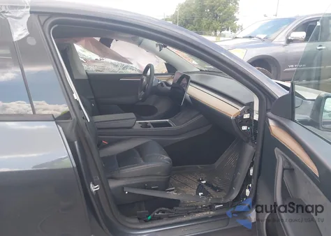 2023 Tesla Model Y Rwd z USA, uszkodzony, nr VIN 7SAYGDED6PF945373